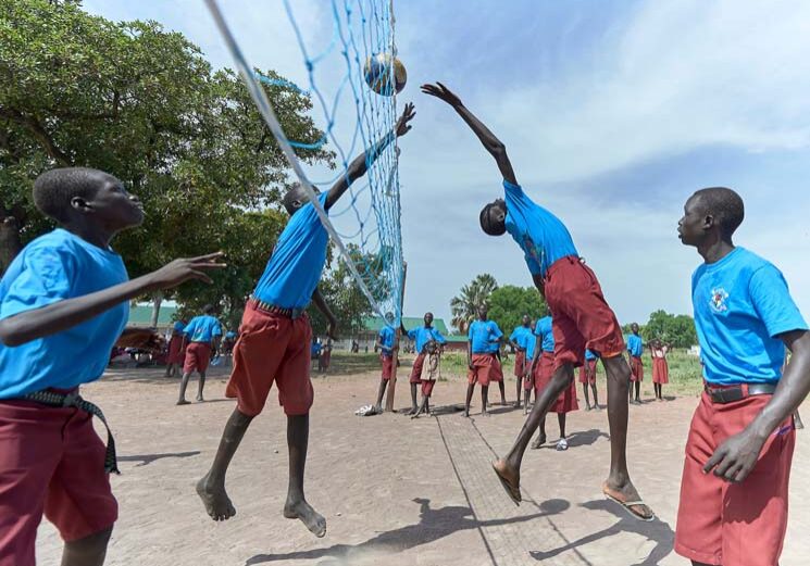 Students play volleyball at the Loreto Primary School in Rumbek, South Sudan. While focused on educating girls from throughout the war-torn country, the school, run by the Institute for the Blessed Virgin Mary--the Loreto Sisters--of Ireland, also educates children from nearby communities.