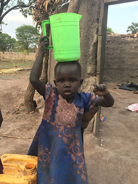 Child at bore hole Rumbek South Sudan